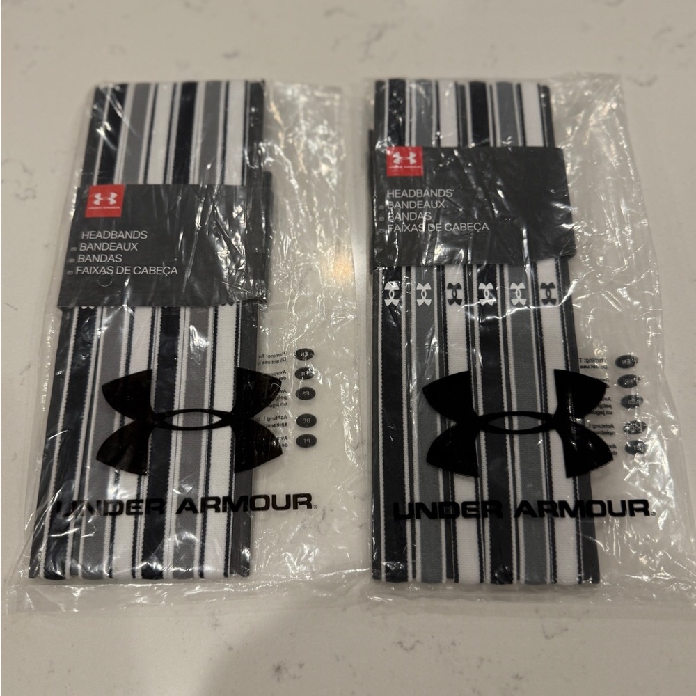 Under Armour Striped Black and White Headbands. 6 Per Package. $10 for both.